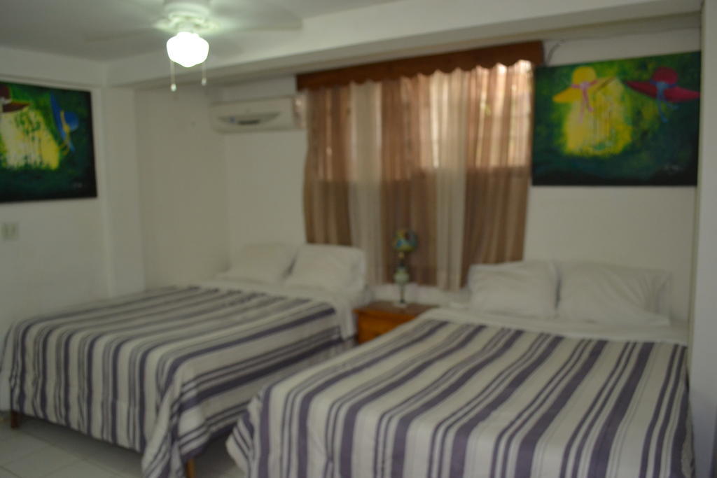 Pacot Breeze Hotel Musseau Phòng bức ảnh